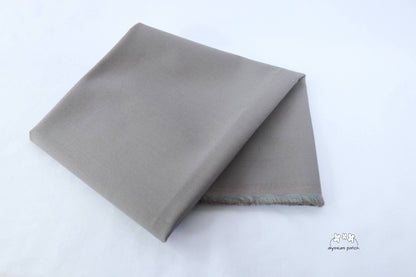 Kona Cotton Solids Zinc fabric folded
