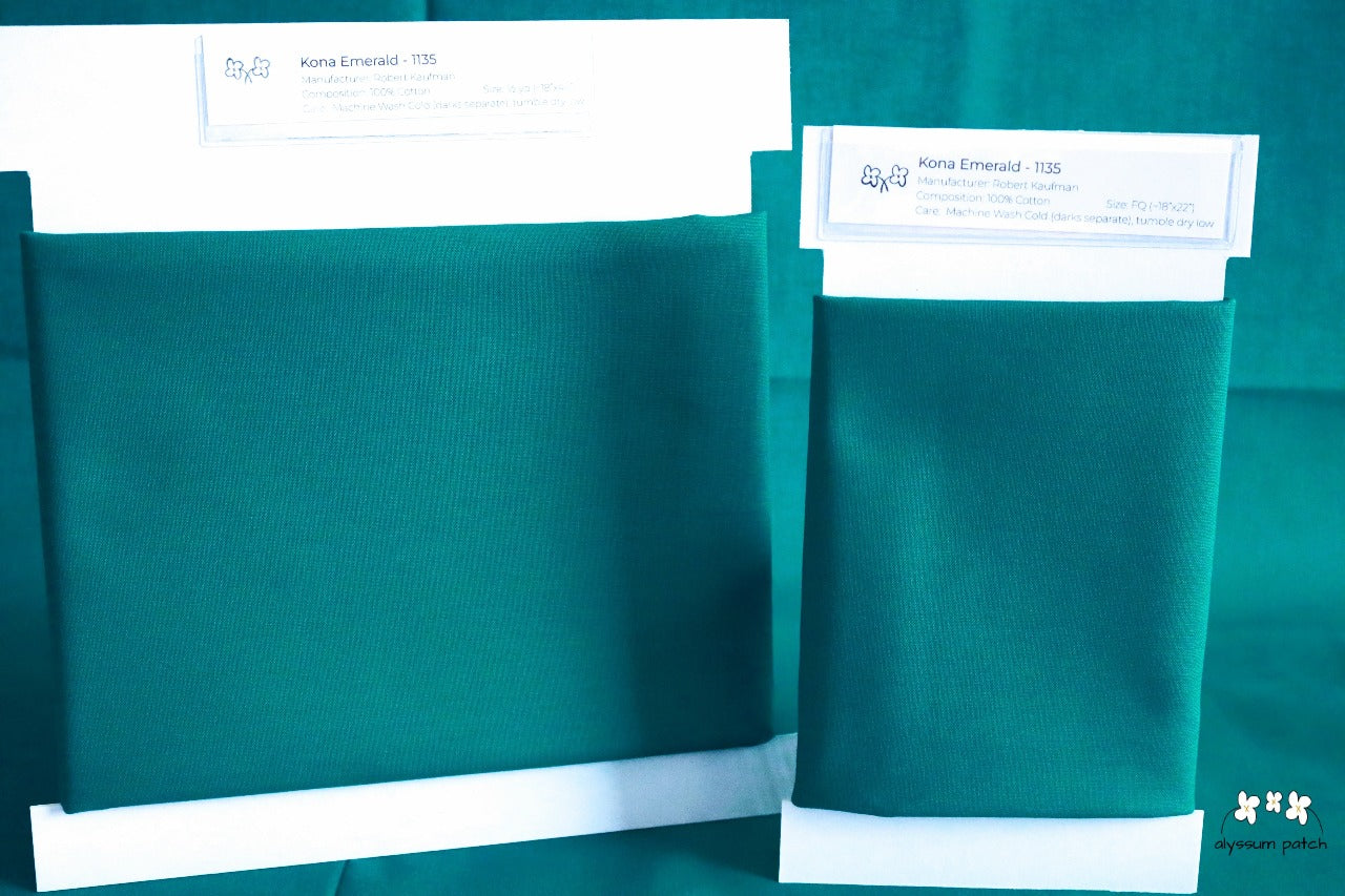 Kona Solids Emerald precut fat quarter and half yard fabric wrapped on fabric winders