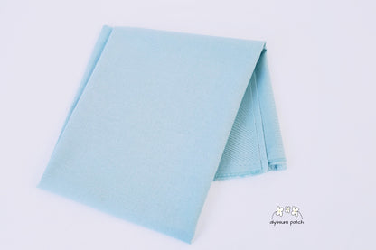 Kona Cotton Solids Fog fabric folded